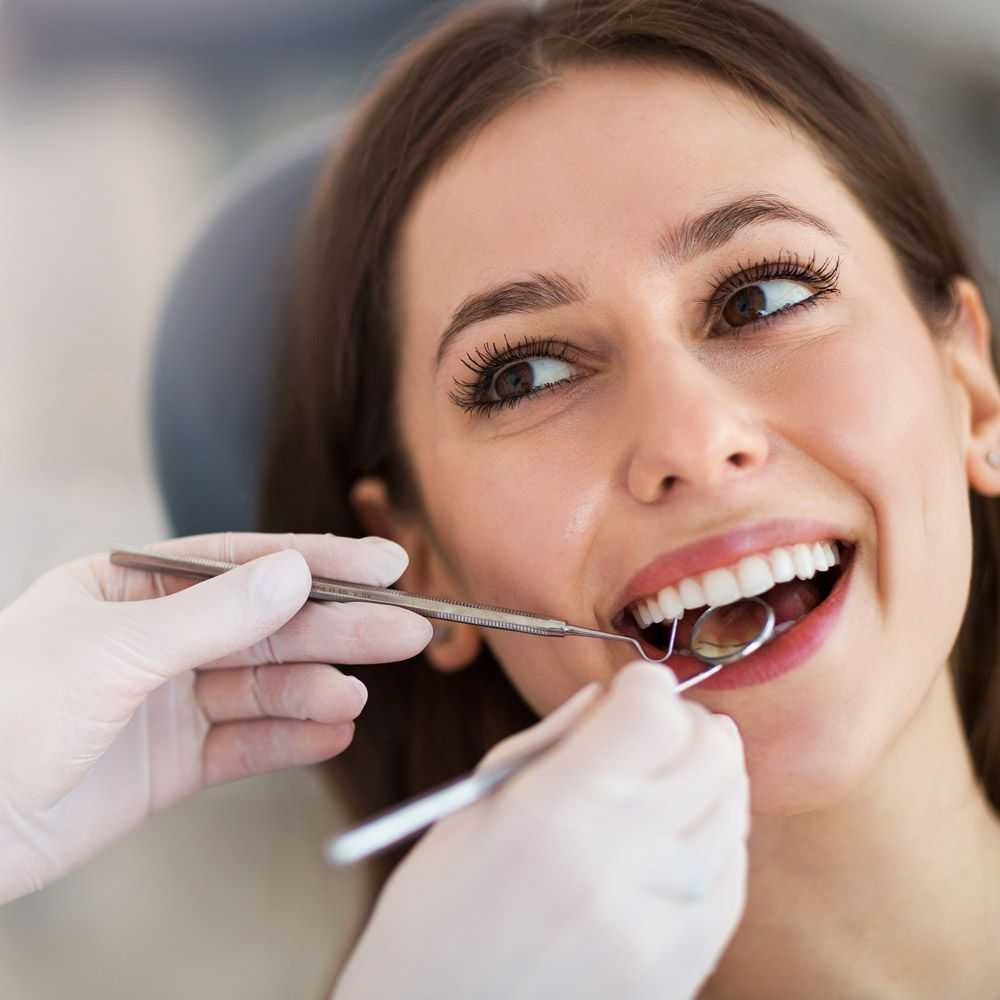 Woman undergoing dental exam